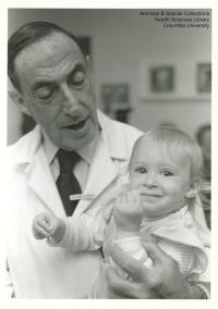 Dr. Wolff with a child